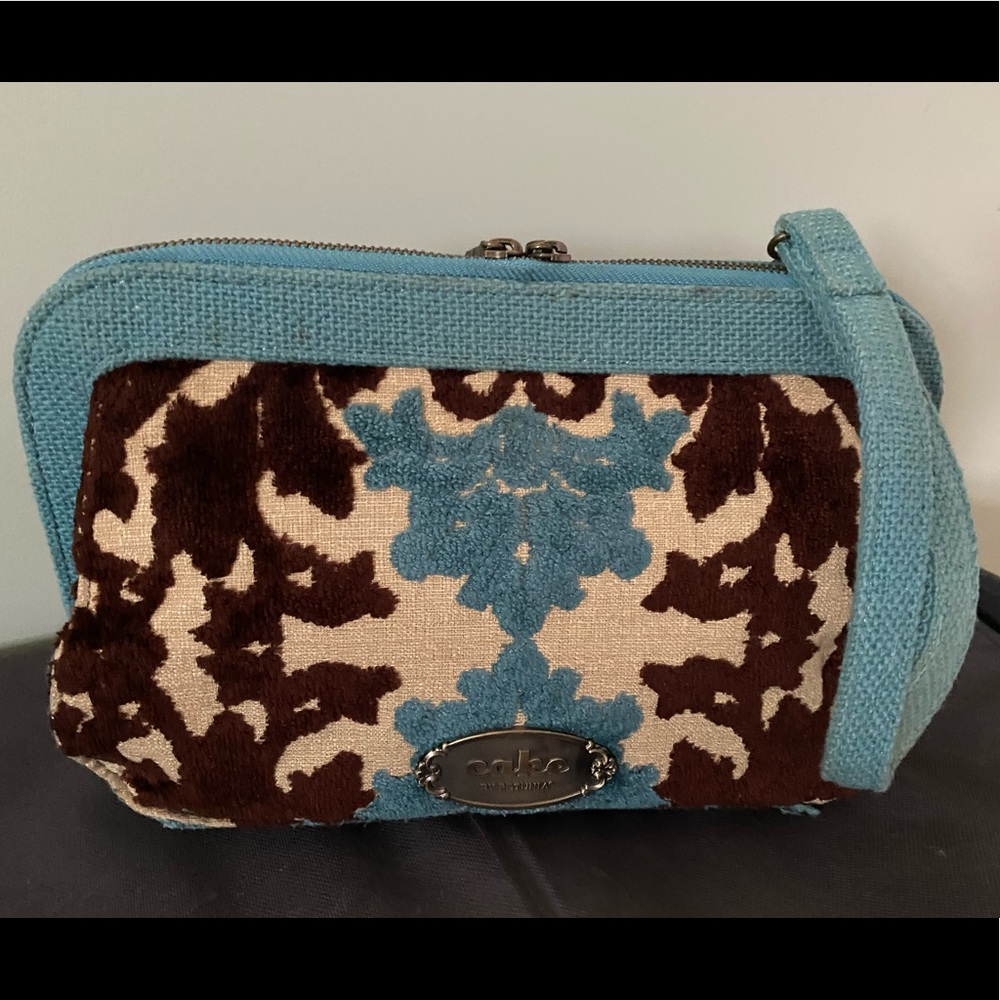 Cake by Petunia Pickle Bottom diaper Clutha bag 💼